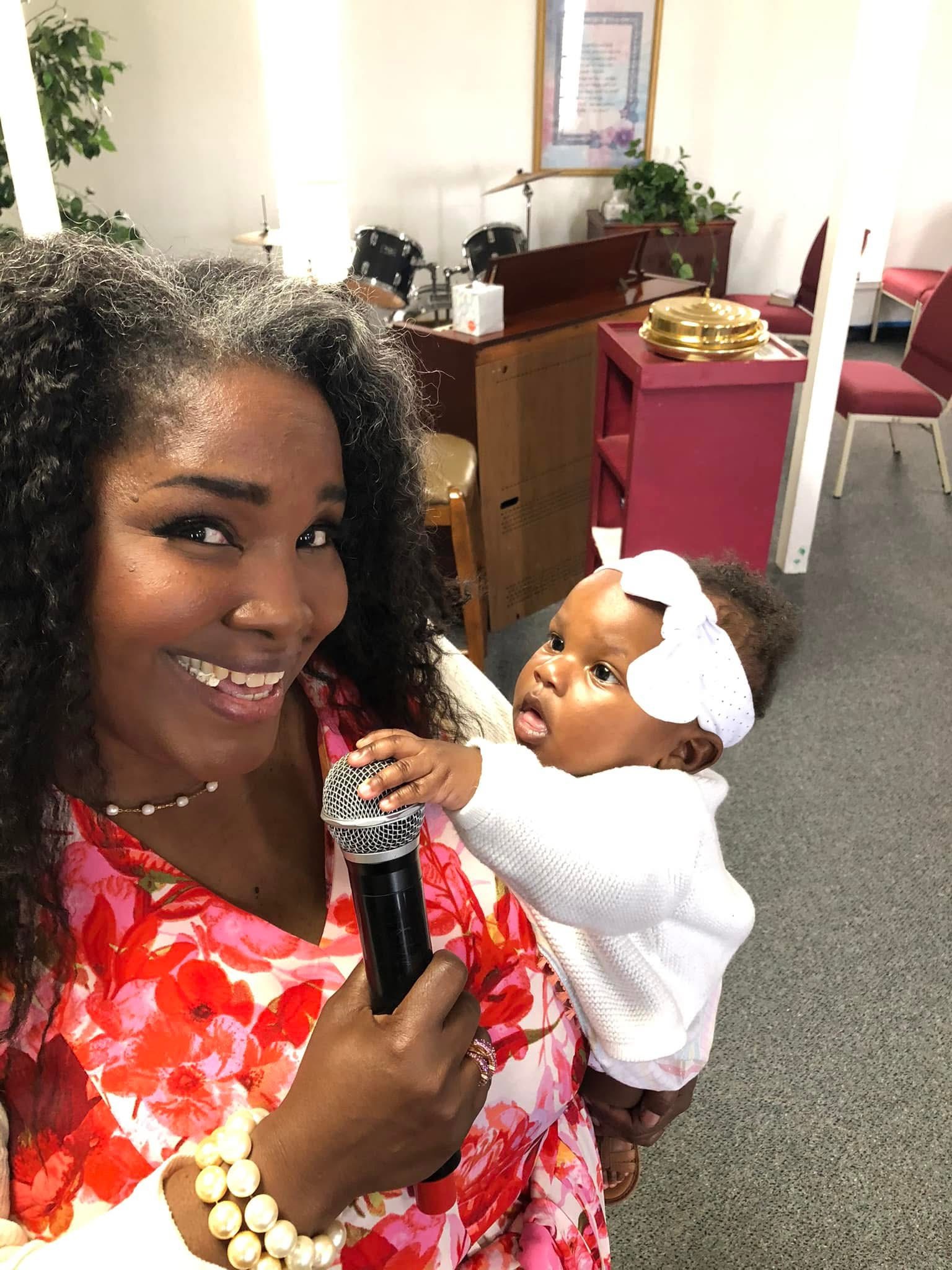 A warm moment with a child during Sunday service at Prayer Life Church